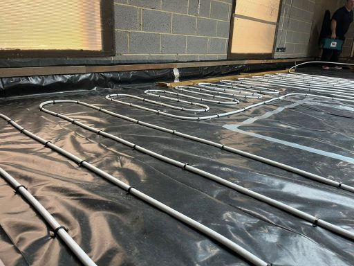 UFH install Underfloor heating pipes.